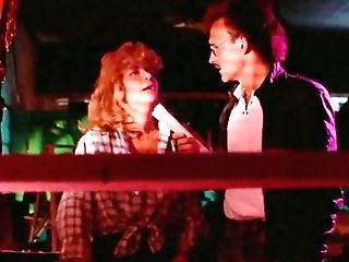 Big-boobed Woman Grapples And Lifts A Man Against His Will