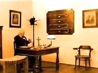 Euro antique spanking scene with a teenage dark-haired