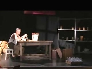 Public hookup on a stage of a theatre as people see